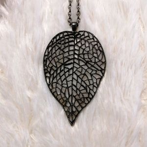 2/$70 Beautiful leaf pendant on long chain.